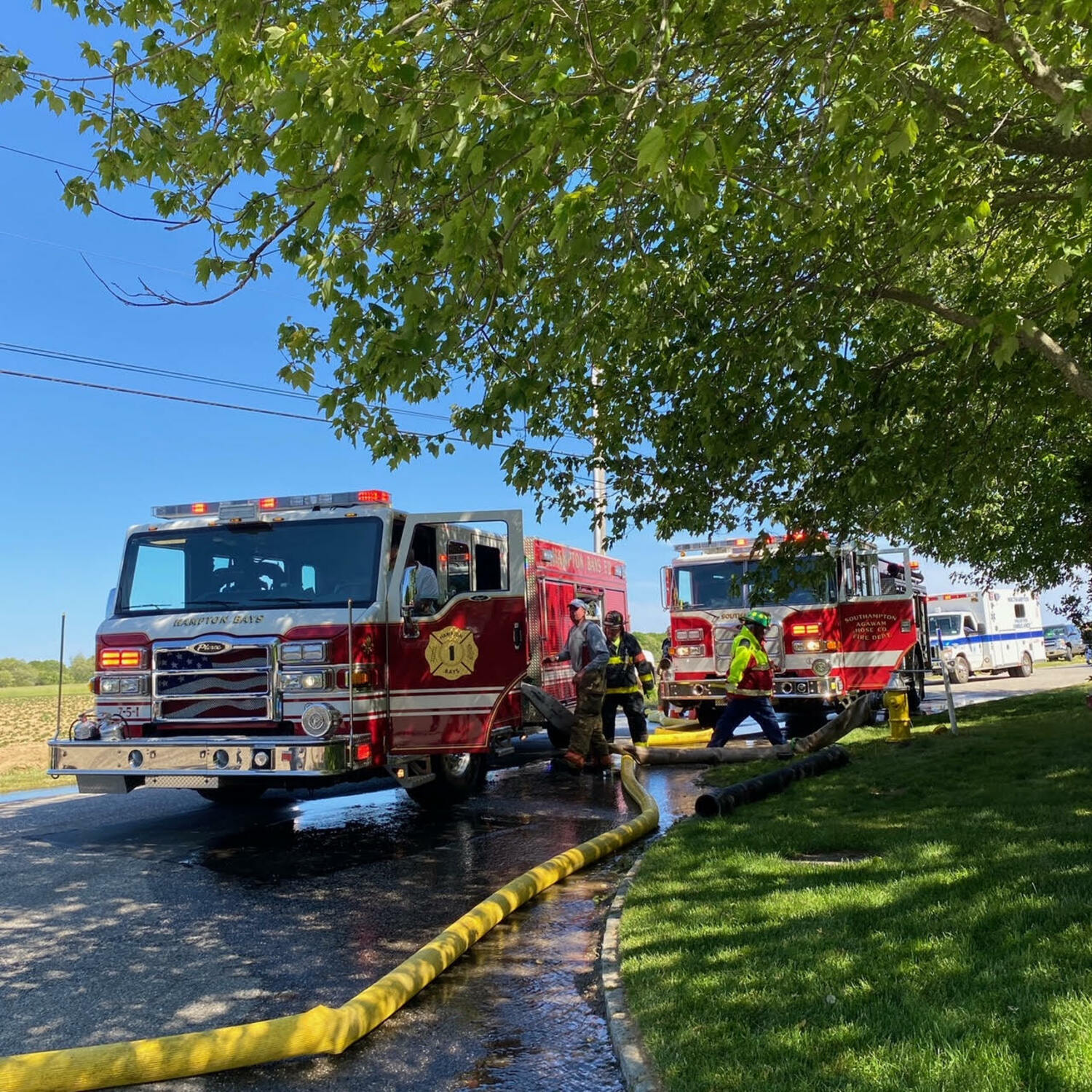 Volunteers from Hampton Bays Fire Department were among those who responded to the fire on Farmstead Lane in Water Mill on May 28.