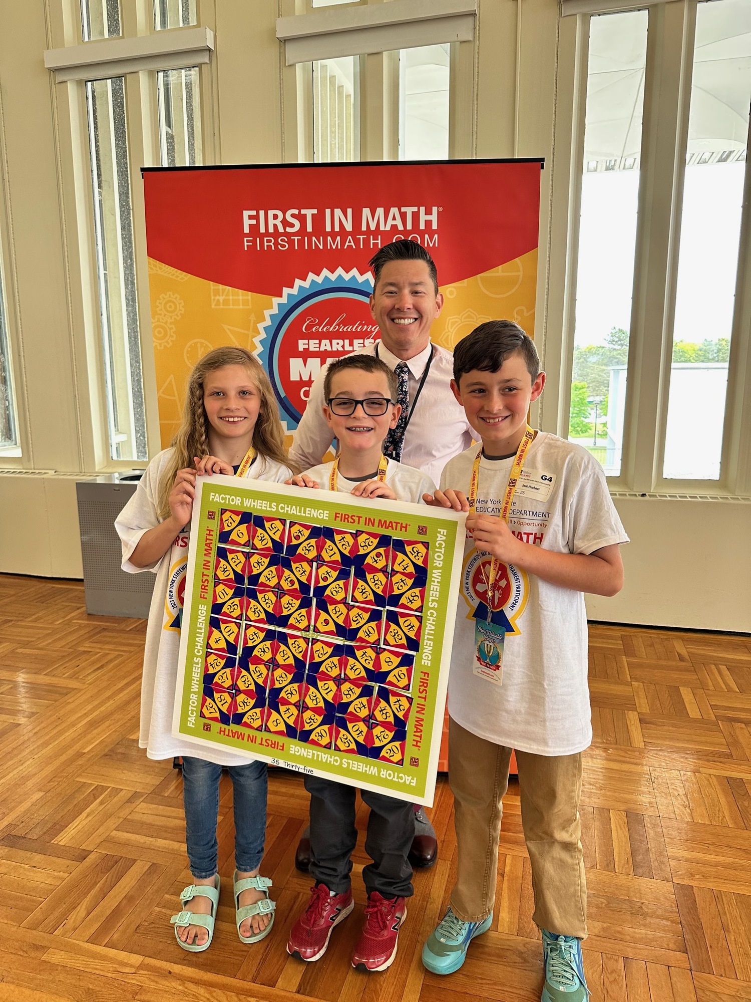 Three Hampton Bays Elementary School fourth graders, from left, William Loudenslager, Jack Huebner and Annabel Ramsay, took third place at the 2023 New York State Education Department First in Math Tournament held in Albany on May 20. The students earned their spots in the competition after receiving top scores on a 15-minute, online tournament qualifier test. They were among a select group of students from only seven schools on Long Island and 150 across the state to have qualified. COURTESY HAMPTON BAYS SCHOOL DISTRICT