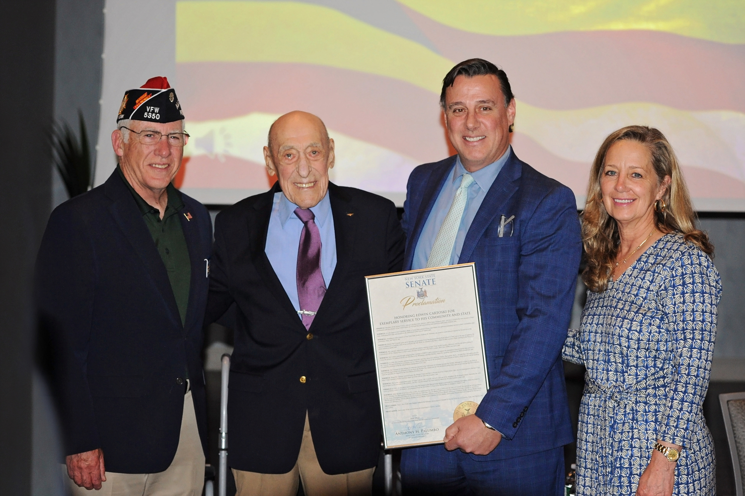 Commander William M. Hughes Jr., from the All American Post 5350, Colonel Edwin Cartoski, New York State Senator Anthony Palumbo and Southampton Town Clerk Sundy Schermeyer at the Veterans Award Ceremony at Peconic Landing.