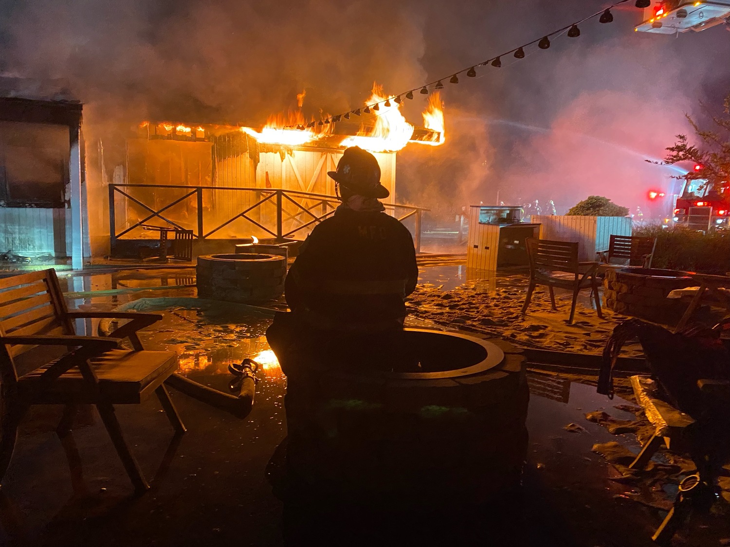  A midnight fire destroyed the barn-like waterfront restaurant building that for years was home to Rick’s Crabby Cowboy Cafe on East Lake Drive in Montauk. COURTESY SCOTT SNOW