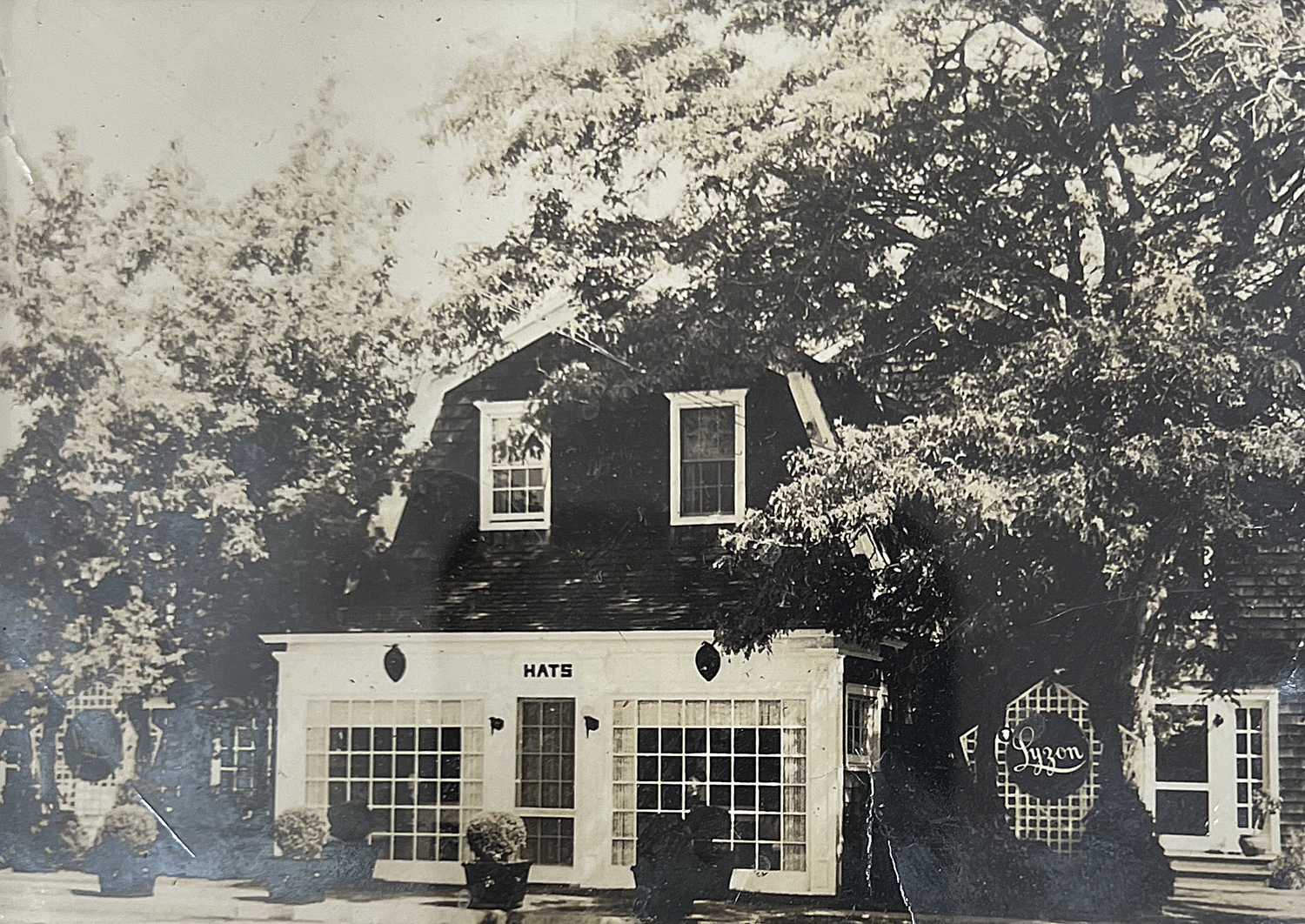 An early photo of the Lyzon Hat Shop.