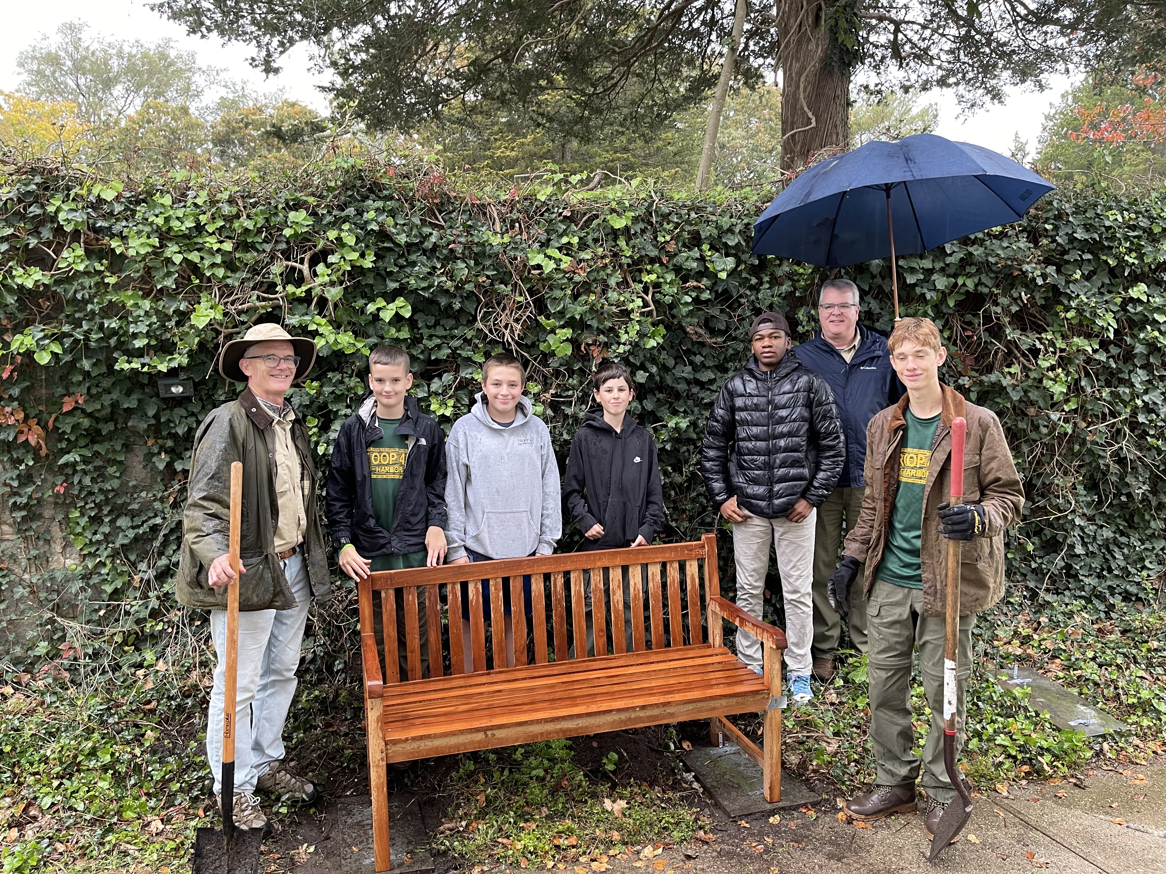 Stewart and the Scouts with the bench at the food pantry.