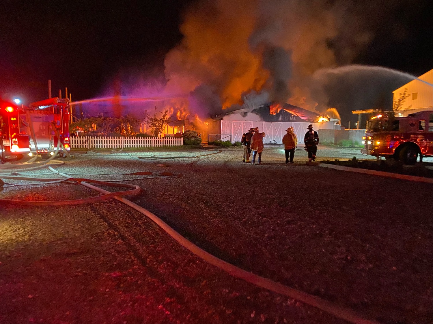 A midnight fire destroyed the barn-like waterfront restaurant building that for years was home to Rick’s Crabby Cowboy Cafe on East Lake Drive in Montauk.  COURTESY SCOTT SNOW