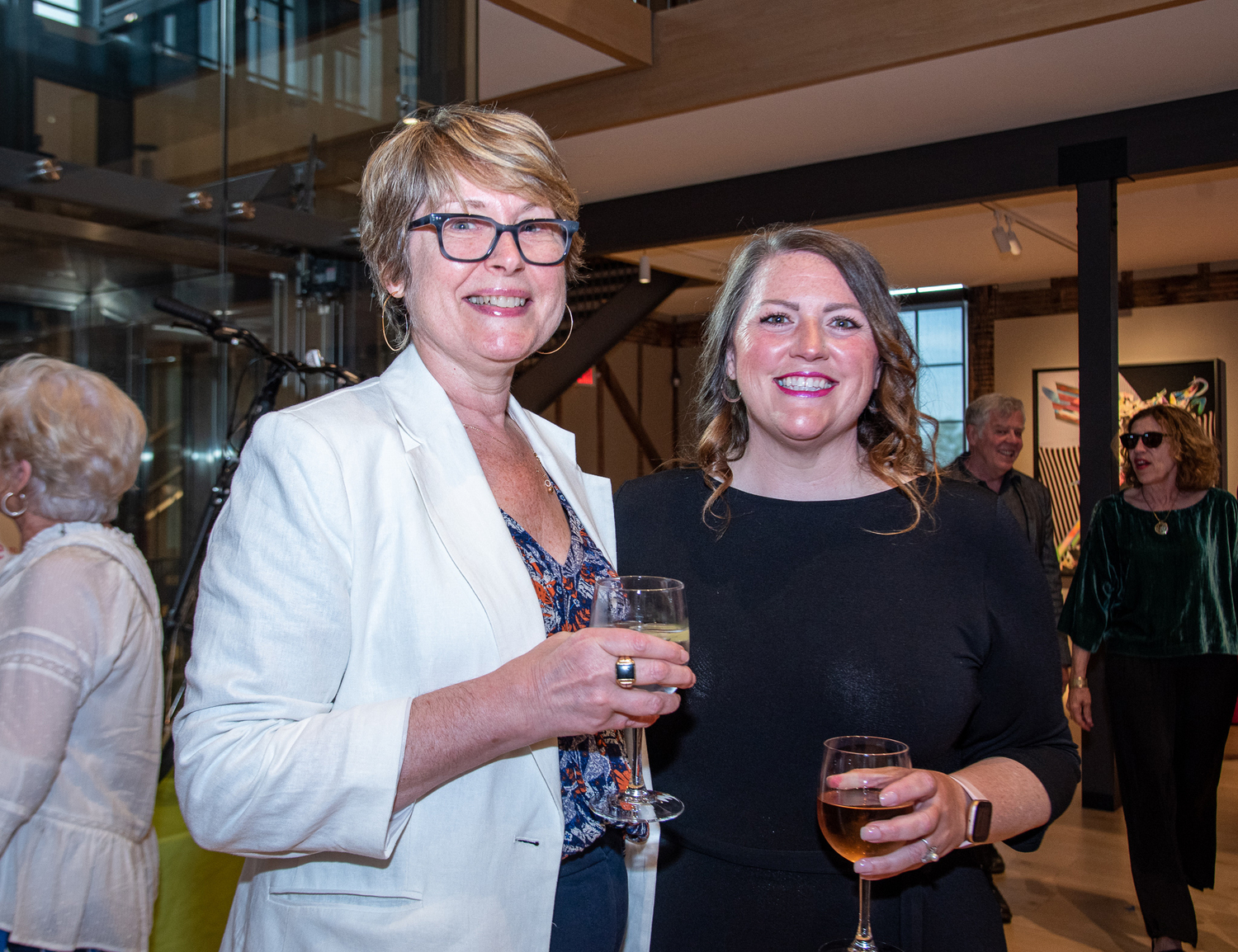 Kathee Burke-Gonzalez and Jennifer Thompson at the i-tri spring cocktail party and auction at he church in Sag Harbor on Saturday.  LISA TAMBURINI