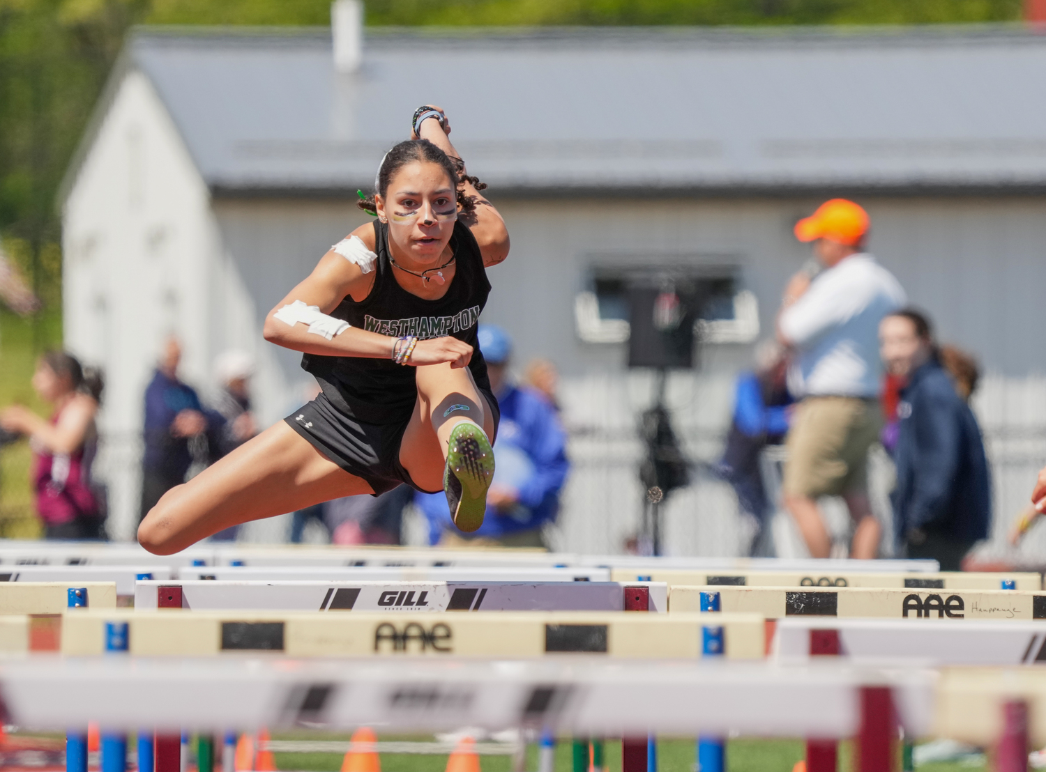 Westhampton Beach senior Kylah Avery finished third in the county in the 100-meter hurdles on Thursday, May 25.   RON ESPOSITO