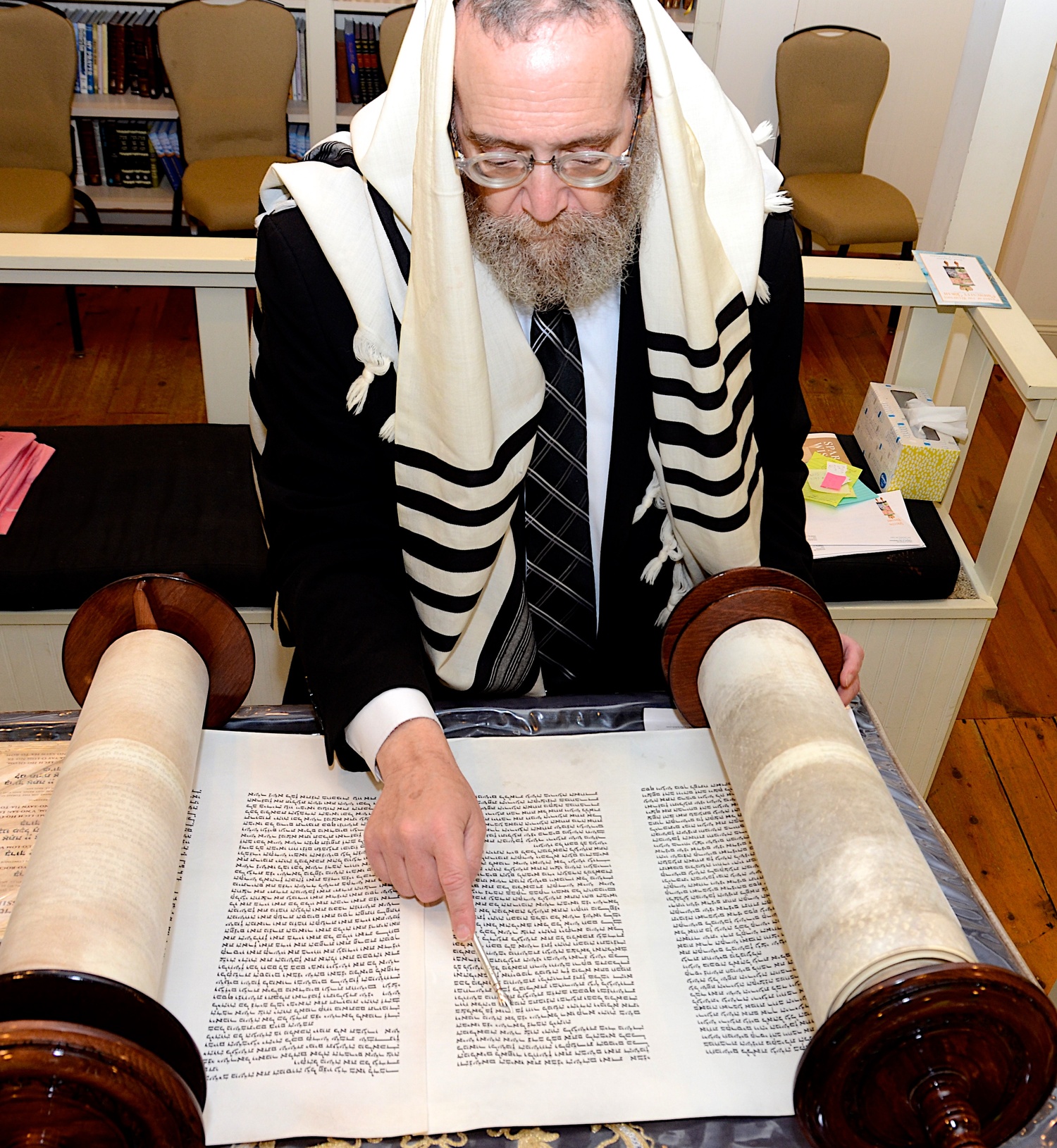 Chabad of the Hamptons Rabbi Leibel Baumgarten reads from the Torah. KYRIL BROMLEY