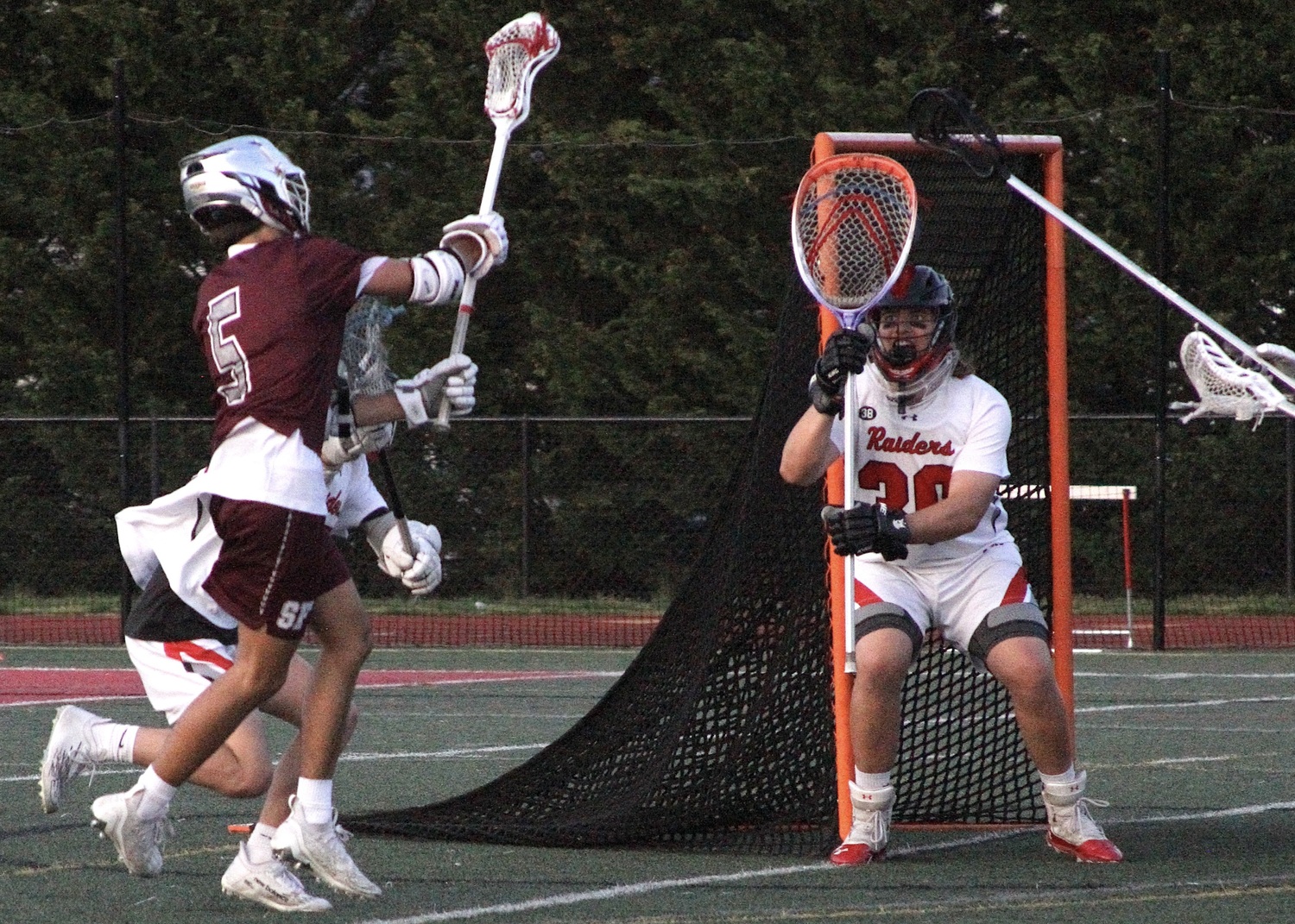 Senior midfielder JP Amaden faces firing before dishing the ball off to sophomore attack Slate Glick for the game-tying goal with 8 seconds left. DESIRÉE KEEGAN