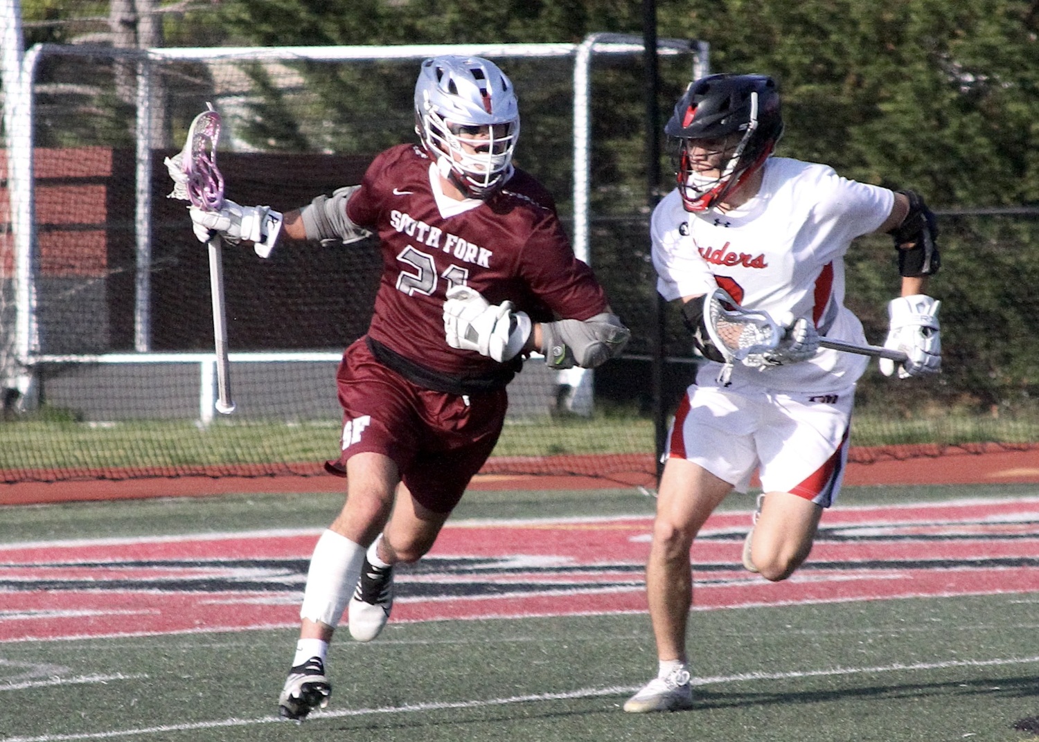Junior midfielder Jack Cooper moves the ball around the back of the cage. DESIRÉE KEEGAN