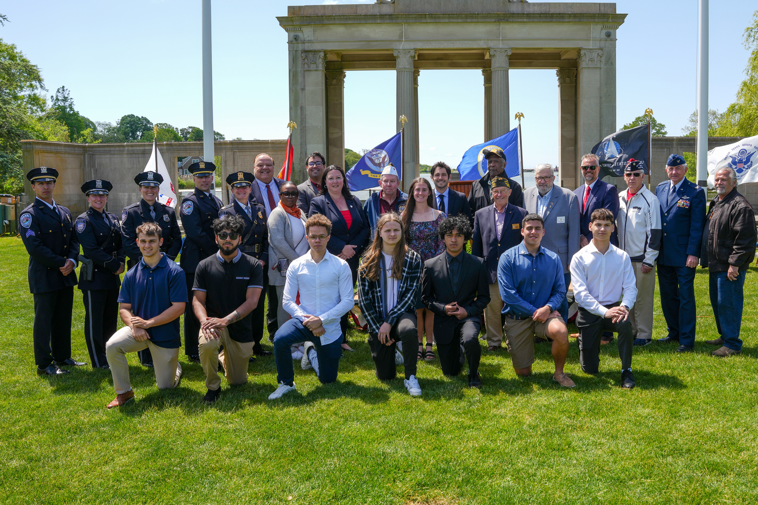 Elected officials, veterans,  and police gathered to honor graduating seniors who will join the military at an annual ceremony in Agawam Park in Southampton on May 26.    RON ESPOSITO