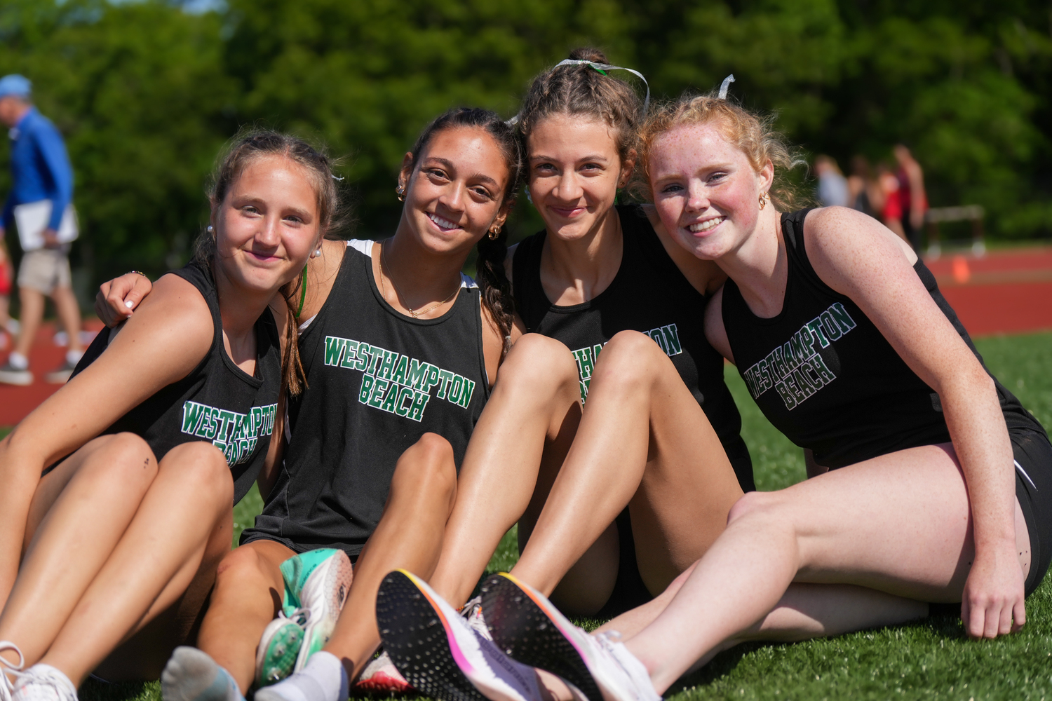 Anna Blanco, left, Mia Valenzuela, Jamie Kelly and Sarah Gormley all ran in the 400-meter dash for the Hurricanes.  RON ESPOSITO