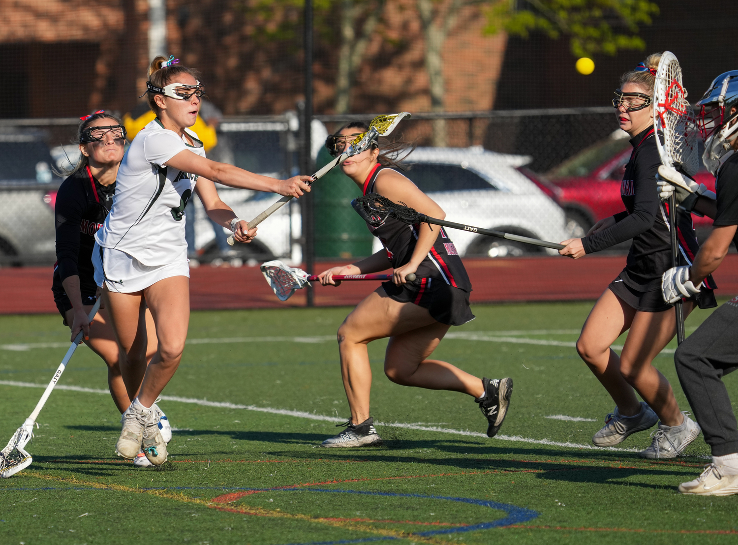 Freshman attack Ava Derby shoots and scores off a free position. RON ESPOSITO