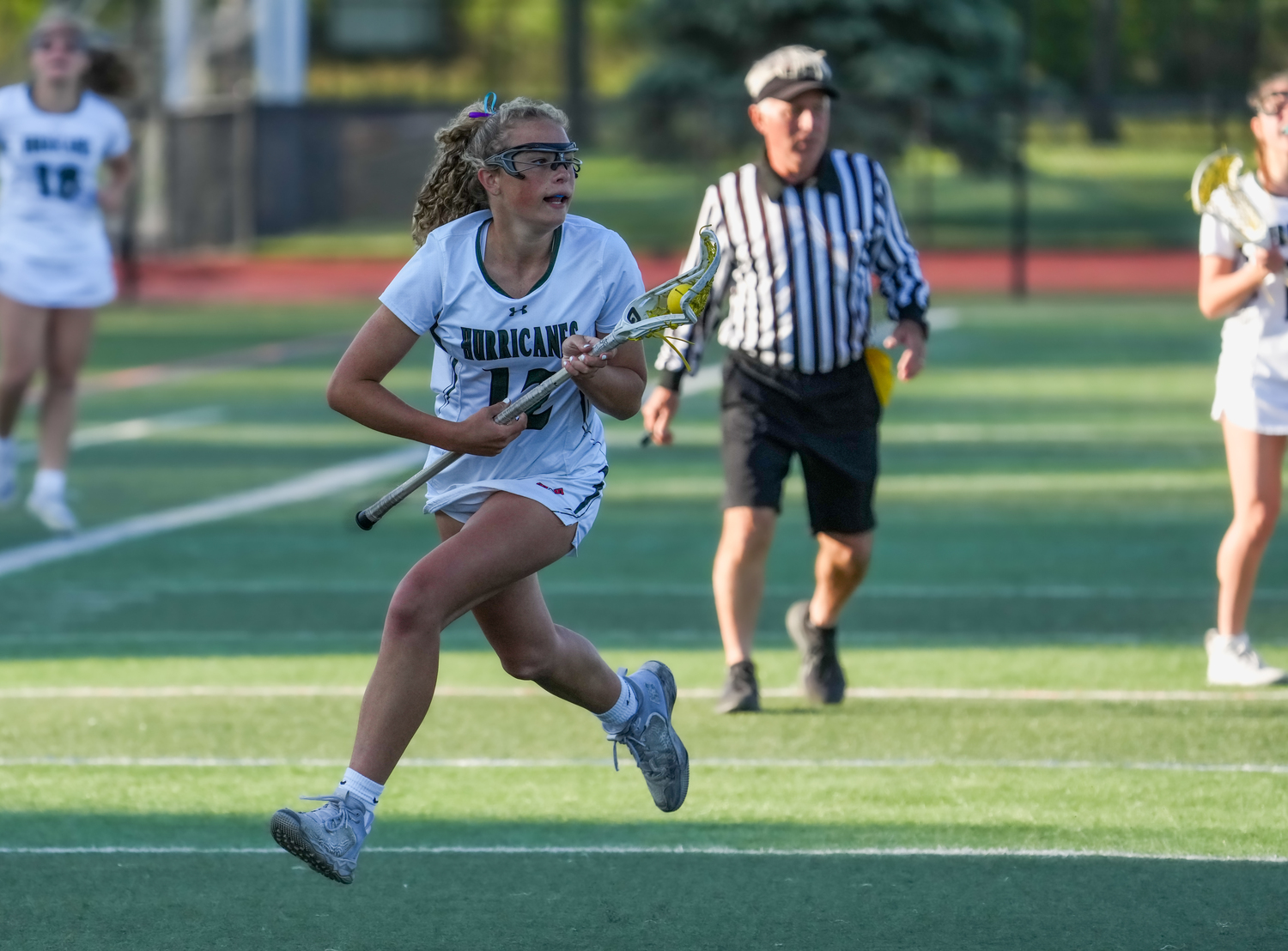 Sophomore attack Meaghan Tufano after scooping up a loose ball. RON ESPOSITO