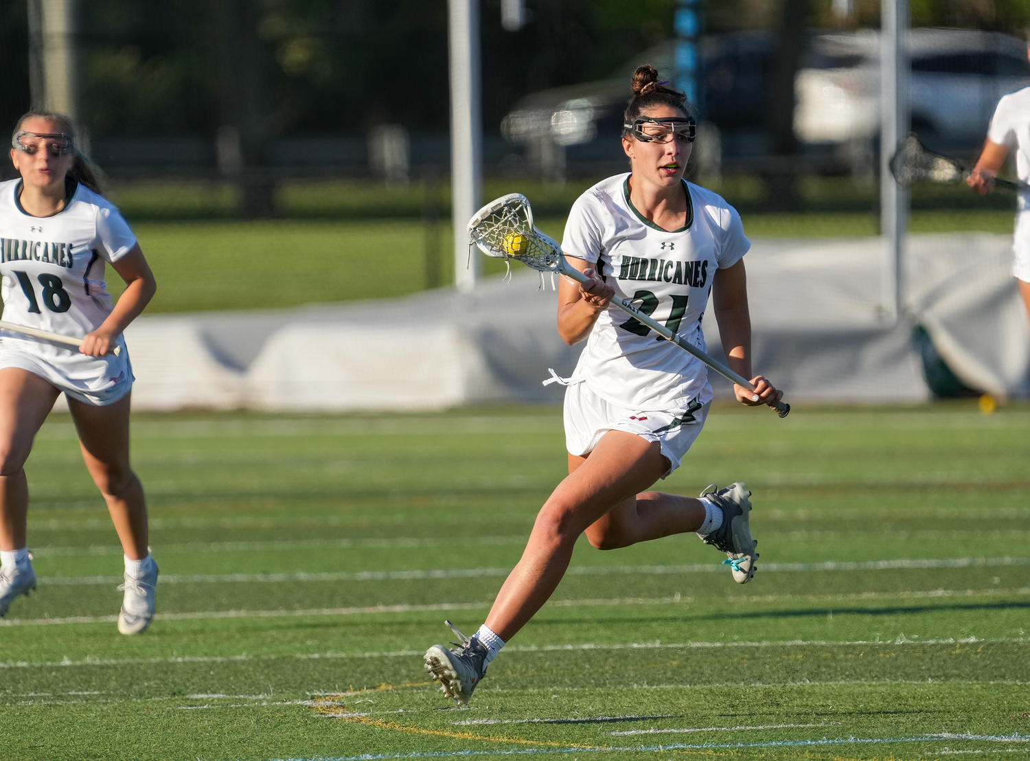 Senior midfielder and defender Reilly Mahon carries the ball into Mt. Sinai's zone off a ground ball pickup. RON ESPOSITO