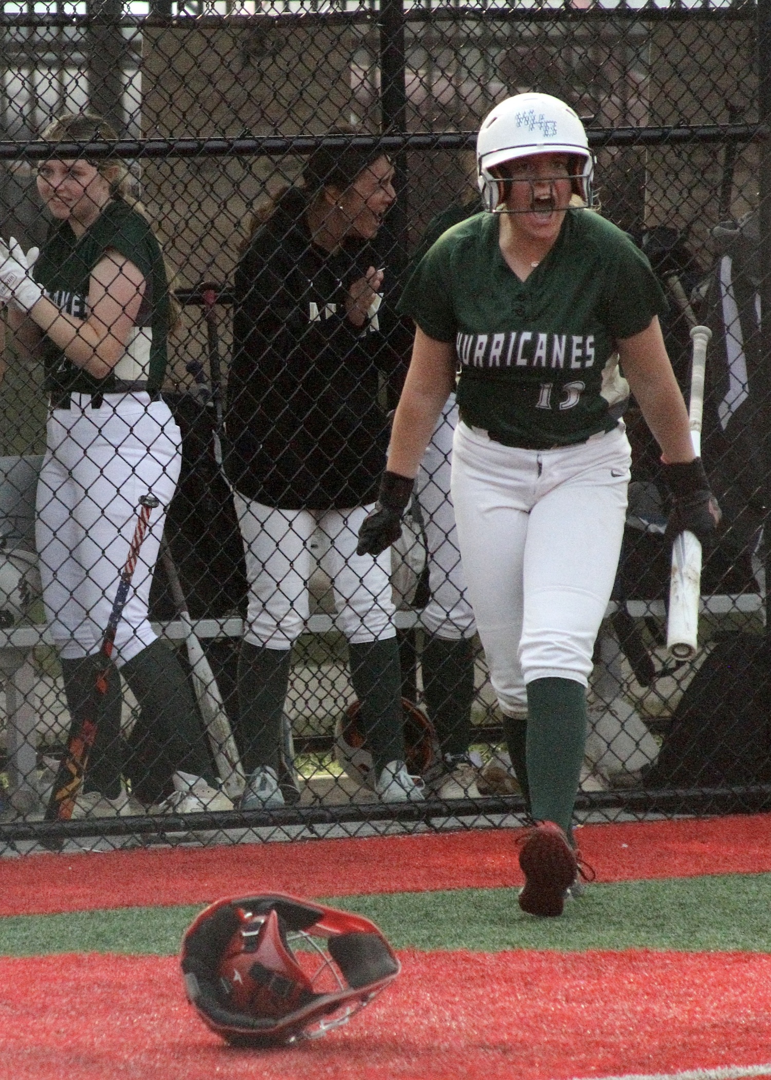 Sophomore outfielder Rylee McGinness screams in celebration of her team's game-tying run. DESIRÉE KEEGAN