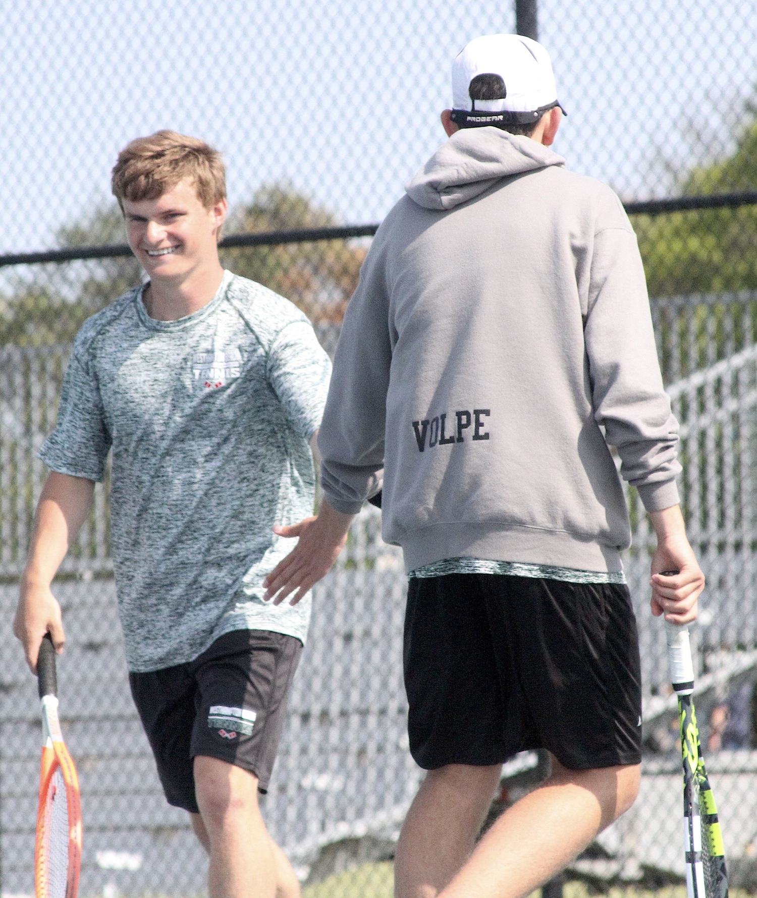 Junior Bobby Stabile celebrates a point with doubles partner Giancarlo Volpe. DESIRÉE KEEGAN
