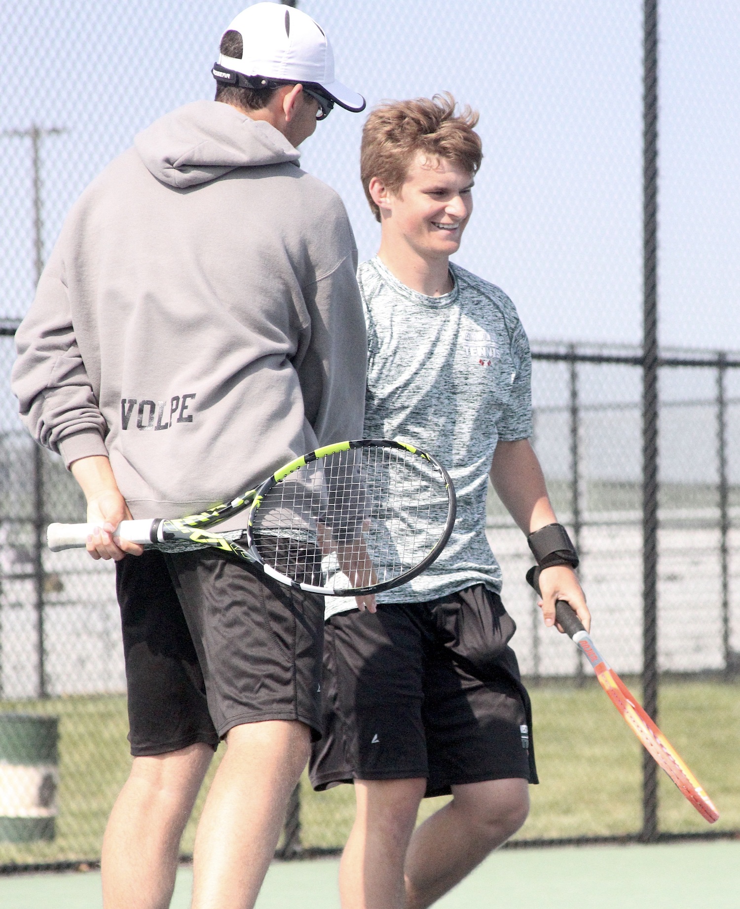 Sophomore Giancarlo Volpe and junior Bobby Stabile celebrate their Division IV doubles championship win. DESIRÉE KEEGAN