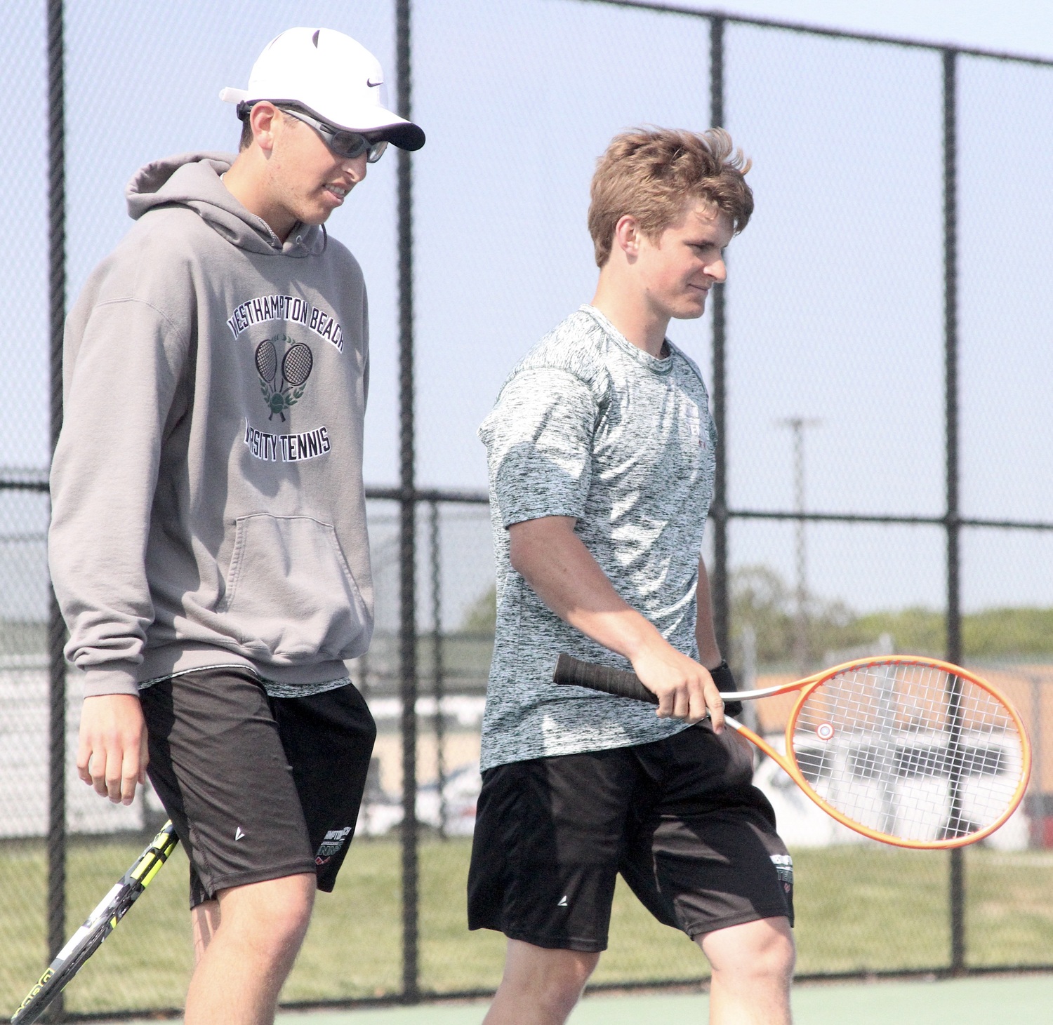 Sophomore Giancarlo Volpe and junior Bobby Stabile celebrate their Division IV doubles championship win. DESIRÉE KEEGAN