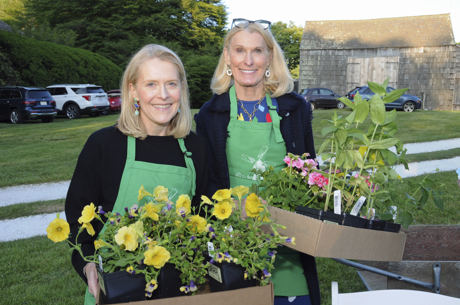 Allegra Kelly and Francie Murphy at the Garden Club of East Hampton's annual garden party and plant sale on the grounds of Mulford Farm in East Hampton on Friday evening. Plant lovers took home armloads and Flexible Flyers full of their favorites and bid for silent auction items. A special 