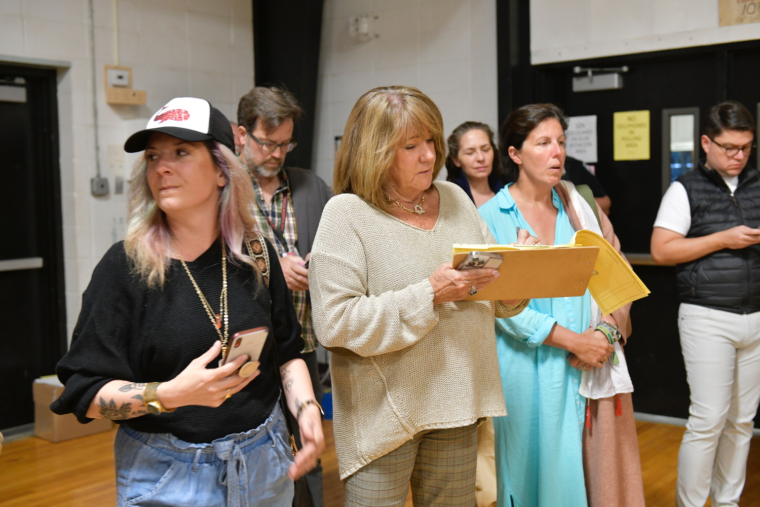 Sag Harbor parent Michele Liot, left, a vocal supporter of the Marsden purchase, and board of education president Sandi Kruel after the announcement that the Marsden proposition had failed by 75 votes. DANA SHAW