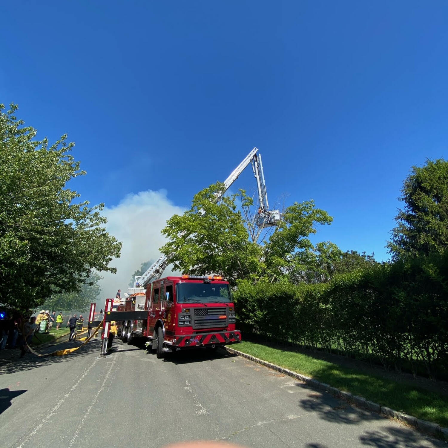 The Southampton Fire Department ladder truck was deployed to the scene of the Farmstead Lane fire in Water Mill Sunday afternoon.