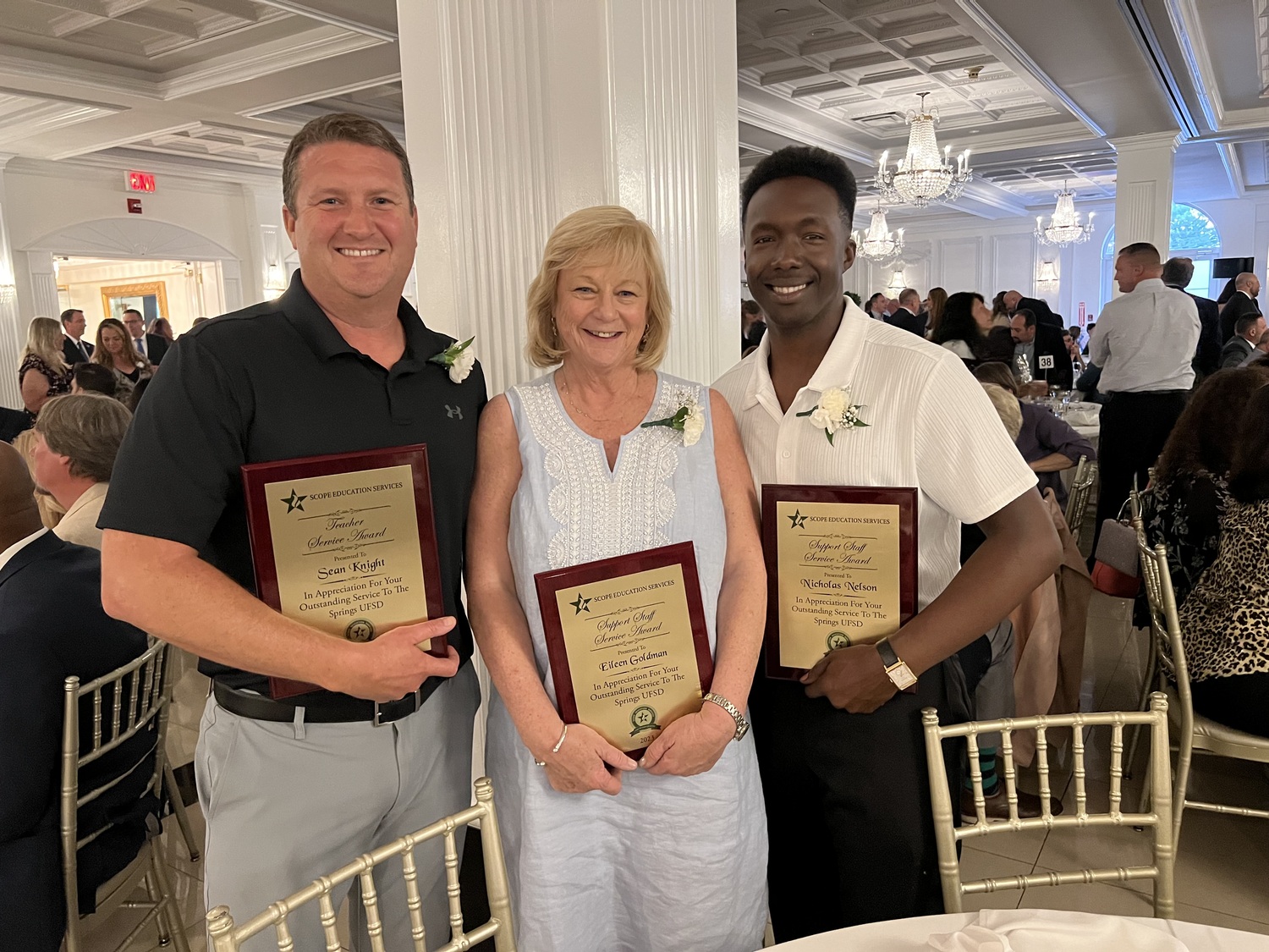 Springs School science teacher Sean Knight, teacher assistant Eileen Goldman and custodian Nick Nelson were recently honored with SCOPE Education Services awards in appreciation of their outstanding service. COURTESY SPRINGS SCHOOL