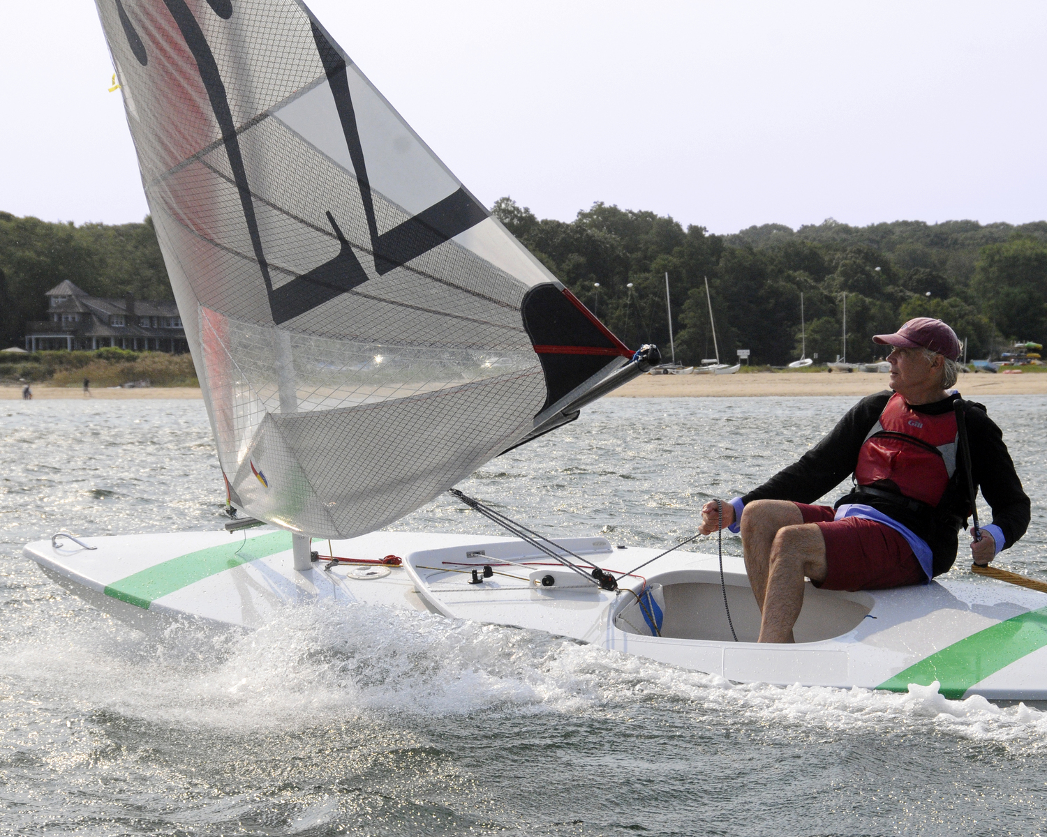 Scott Sandell has been sailing since he was a teen, and he's combined his skill as an artist and sailmaker to create high-performance sails for a fleet of Rocket sailboats sailing out of Breakwater Yacht Club. MIKE MELLA