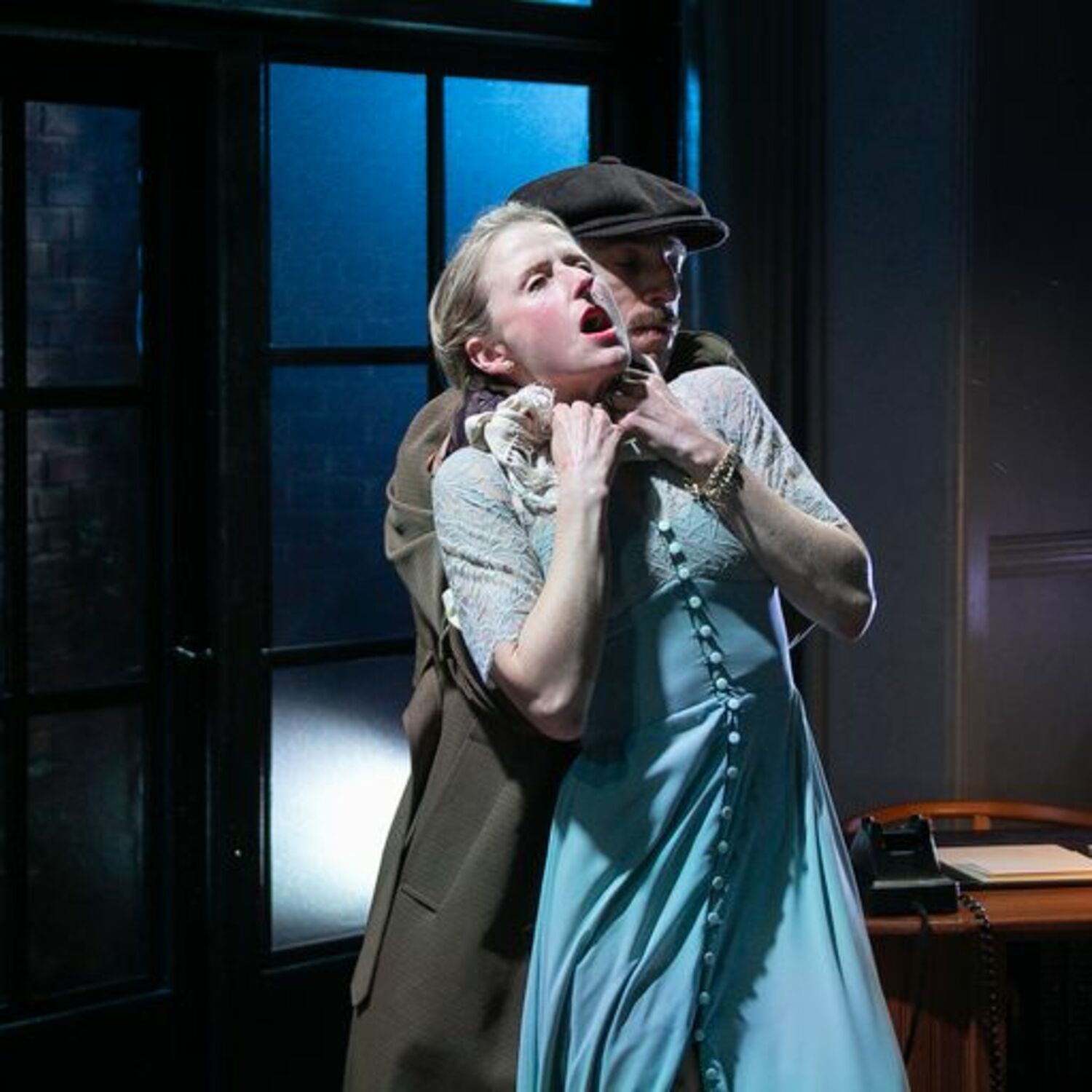 Lesgate (Max Gordon Moore) chokes Margot (Mammie Gummer) in a scene from Bay Street Theater's 