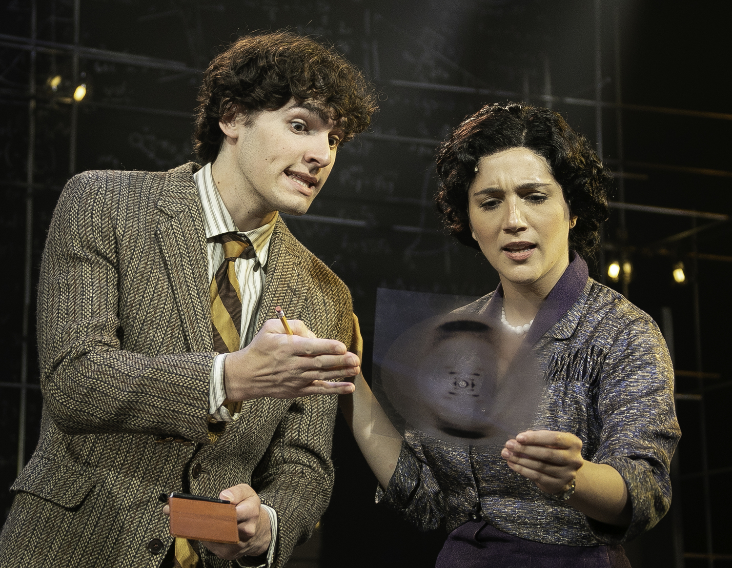 Anthony Joseph Costello as Raymond Gosling and Samantha Massell as Rosalind Franklin in 