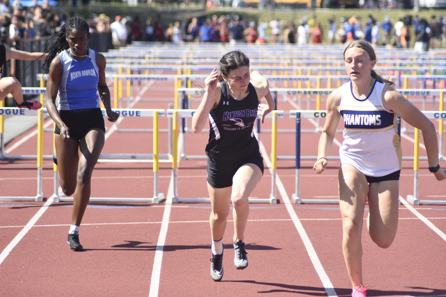 Hampton Bays junior Emma Halsey is heading to states in the 100-meter hurdles.   DREW BUDD