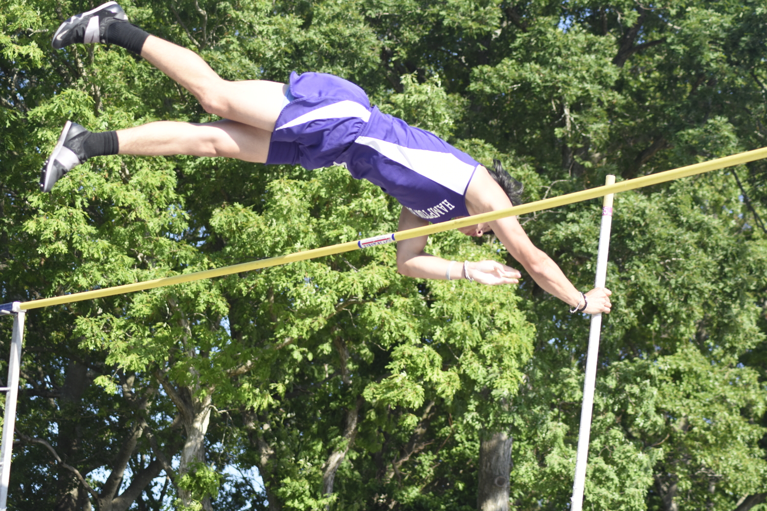 Hampton Bays junior Joffre Proano cleared a personal best 13 feet 6 inches in the pole vault and will be competing upstate this weekend.   DREW BUDD