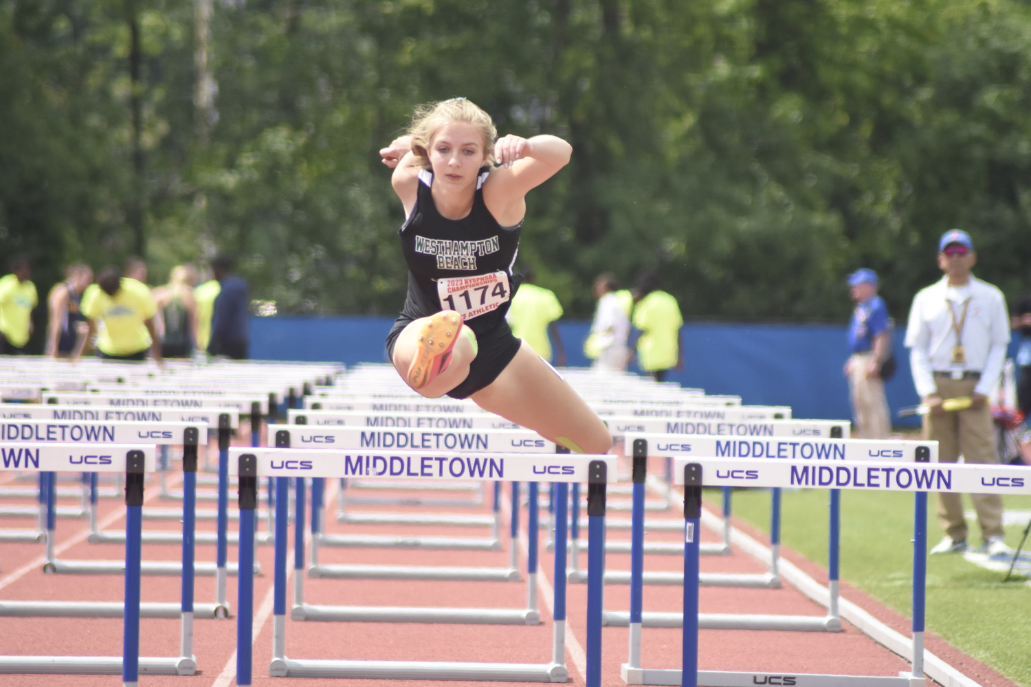 Westhampton Beach junior Madison Phillips in the 100-meter hurdles of the pentathlon.   DREW BUDD