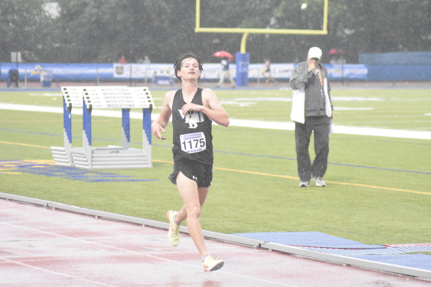 Max Haynia crosses the finish line in fourth place.   DREW BUDD