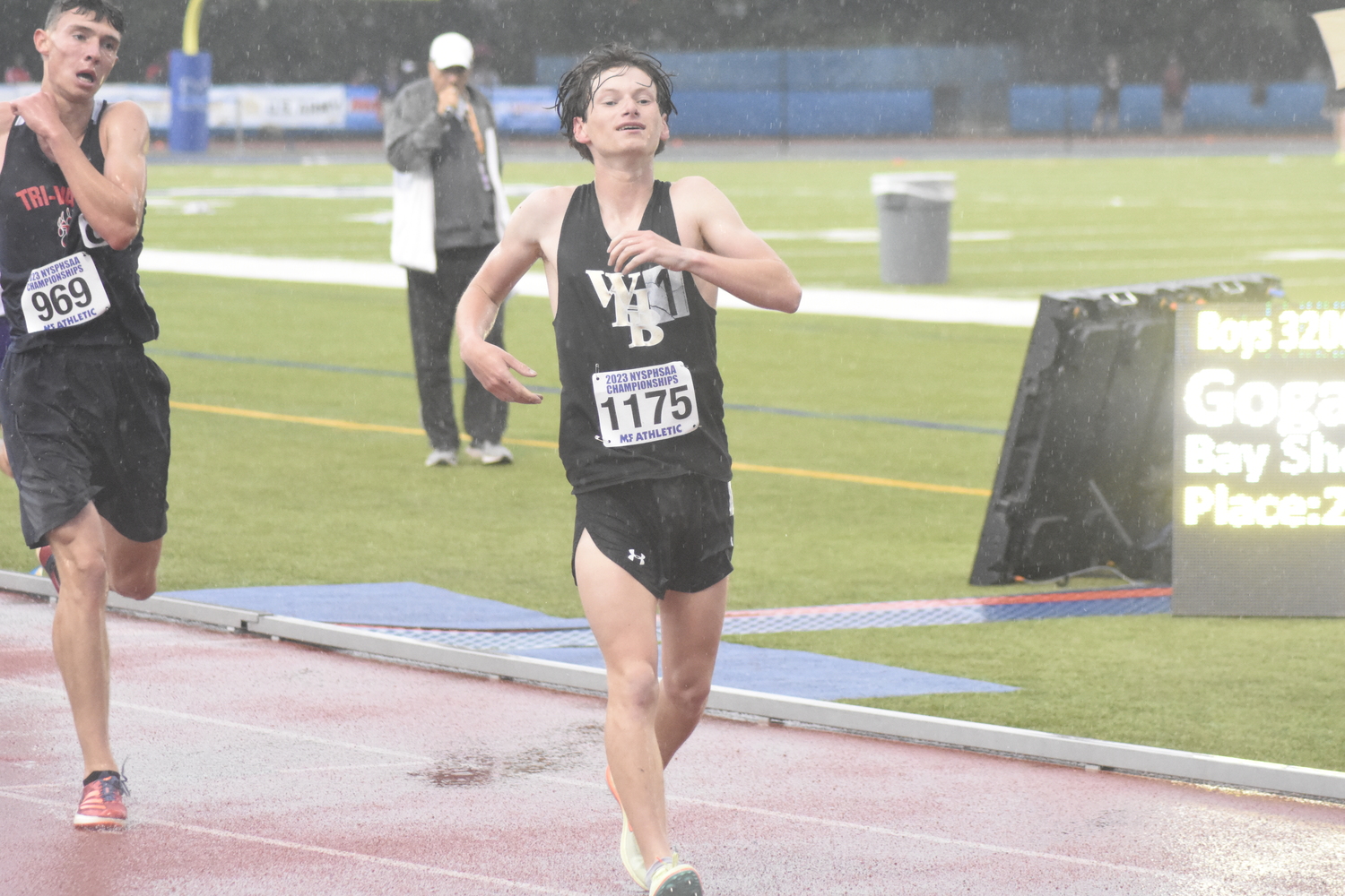 Max Haynia crosses the finish line in fourth place.   DREW BUDD