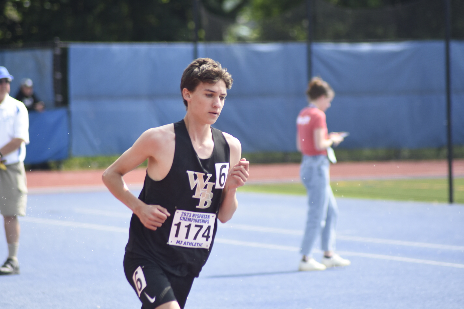 Westhampton Beach junior Trevor Hayes running in the 3,000-meter steeplechase.   DREW BUDD