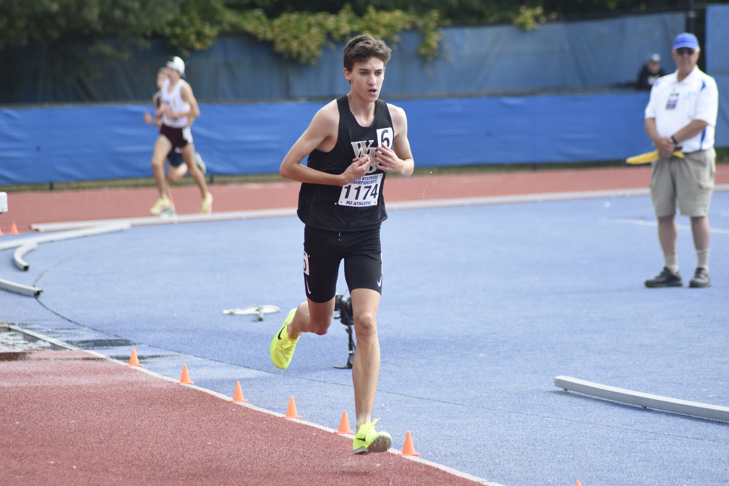 Westhampton Beach junior Trevor Hayes running in the 3,000-meter steeplechase.   DREW BUDD