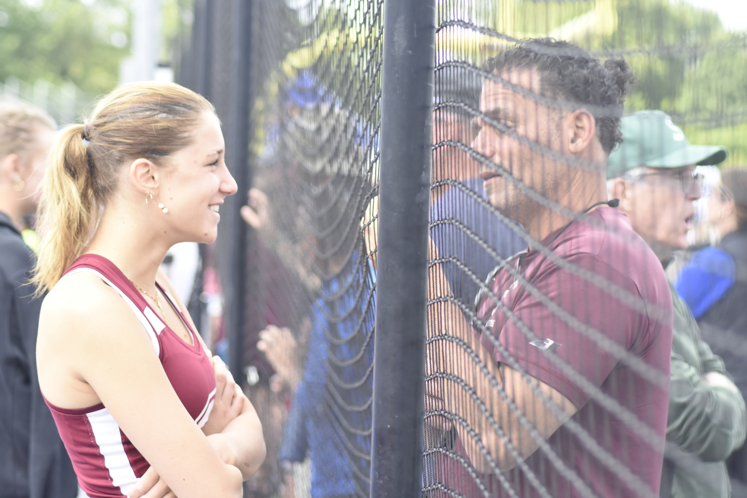 Southampton junior Livia Lombardi-Benvenuto talks to head coach Eddie Arnold.   DREW BUDD