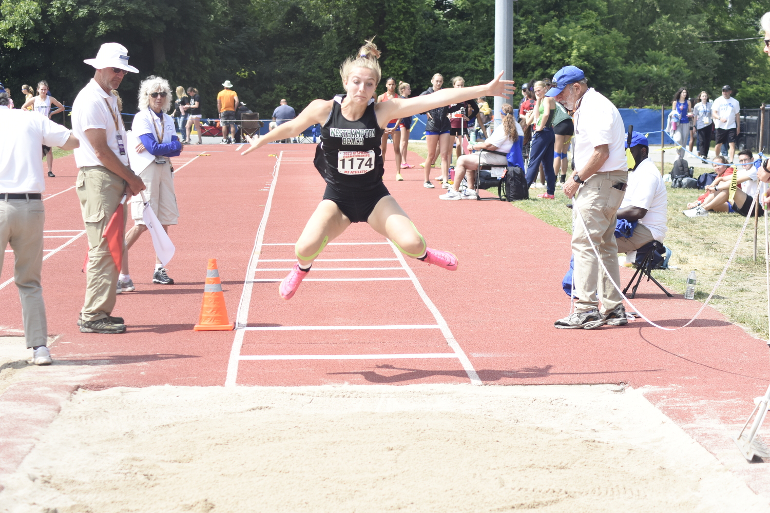 Westhampton Beach junior Maddie Phillips in the long jump of the pentathlon.   DREW BUDD