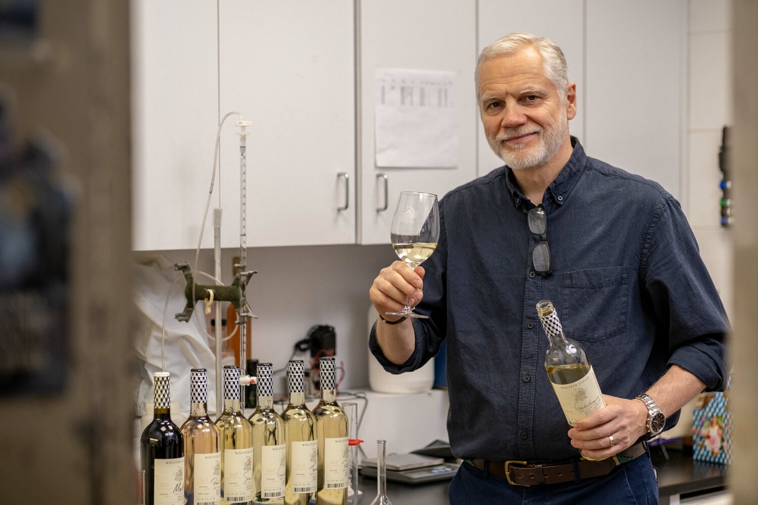 Roman Roth, partner and winemaker at Sagaponack's Wölffer Estate Vineyard, in the lab with the vineyard's Cellar Series. COURTESY WOLFFER ESTATE VINEYARD