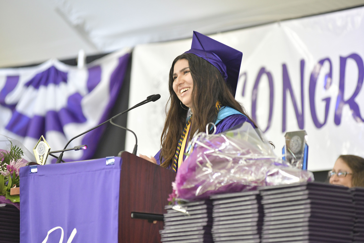 Salutatorian Sofia Solano Cruz givers her speech at Hampton Bays graduation on Saturday.  DANA SHAW