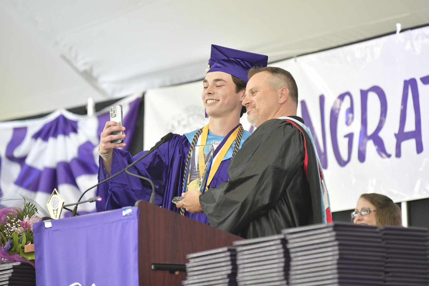 Hampton Bays High School Valedictorian Liam Sutton takes a selfie with Principal Christopher Richardt.  DANA SHAW