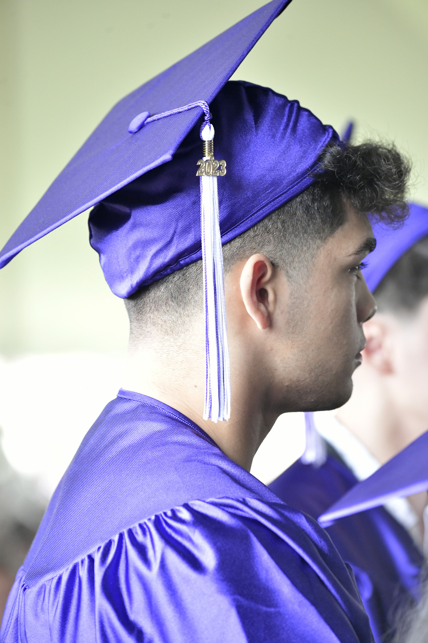 River Gutierrez-Tyler waits to receive his diploma at commencement exercises at Hampton Bays High School on Saturday.  DANA SHAW