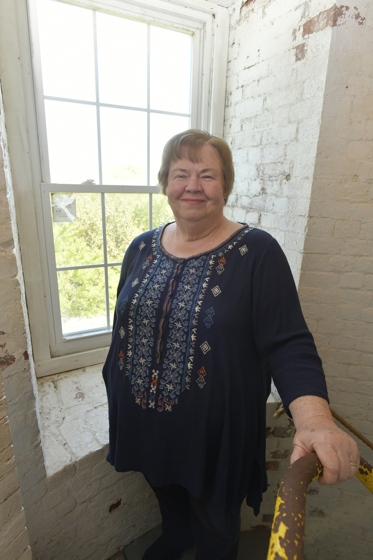 Mary Korpi author of “The Lady Lighthouse Keeper,” at the Horton Point Lighthouse.  DANA SHAW