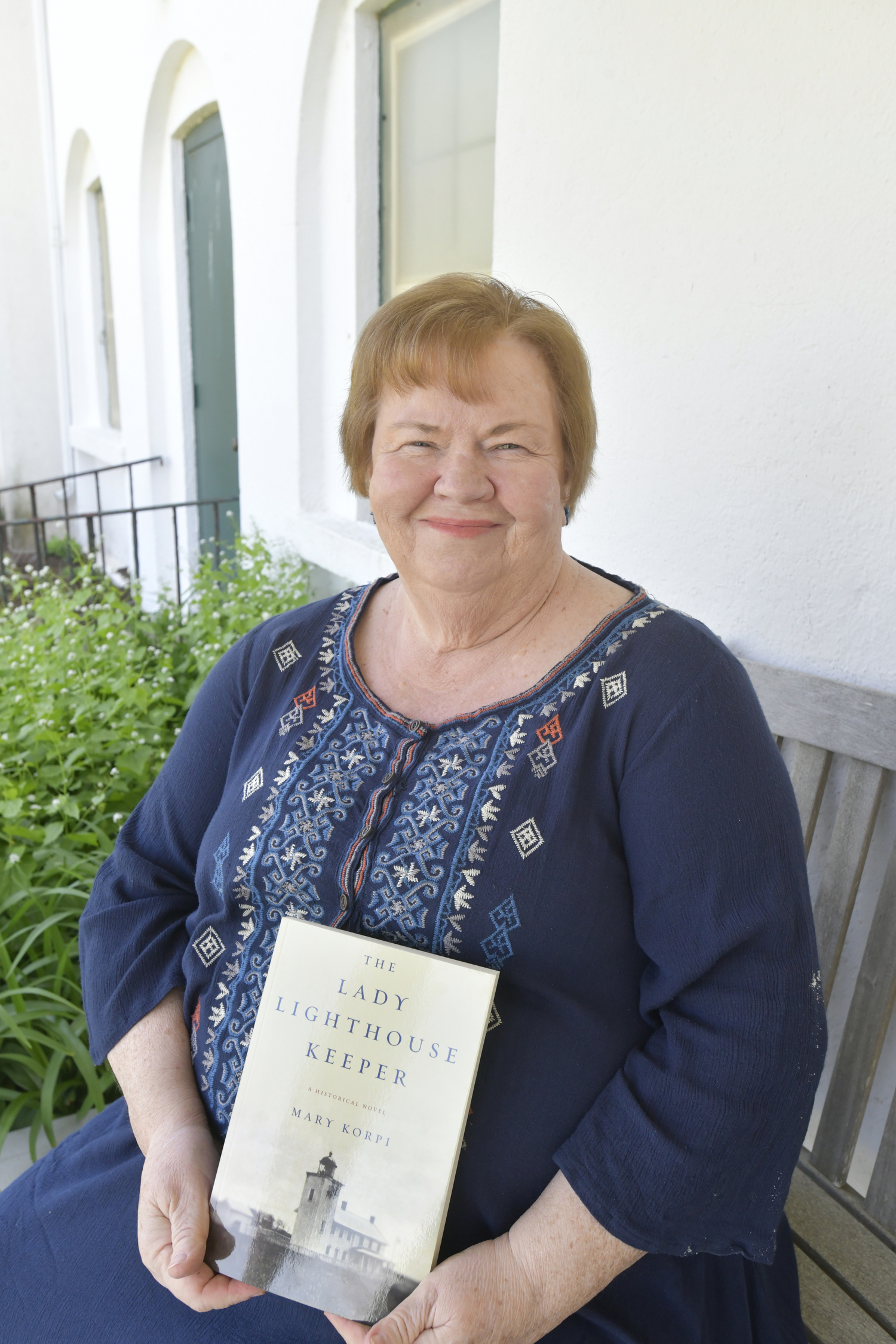 Mary Korpi author of “The Lady Lighthouse Keeper,” at the Horton Point Lighthouse.  DANA SHAW