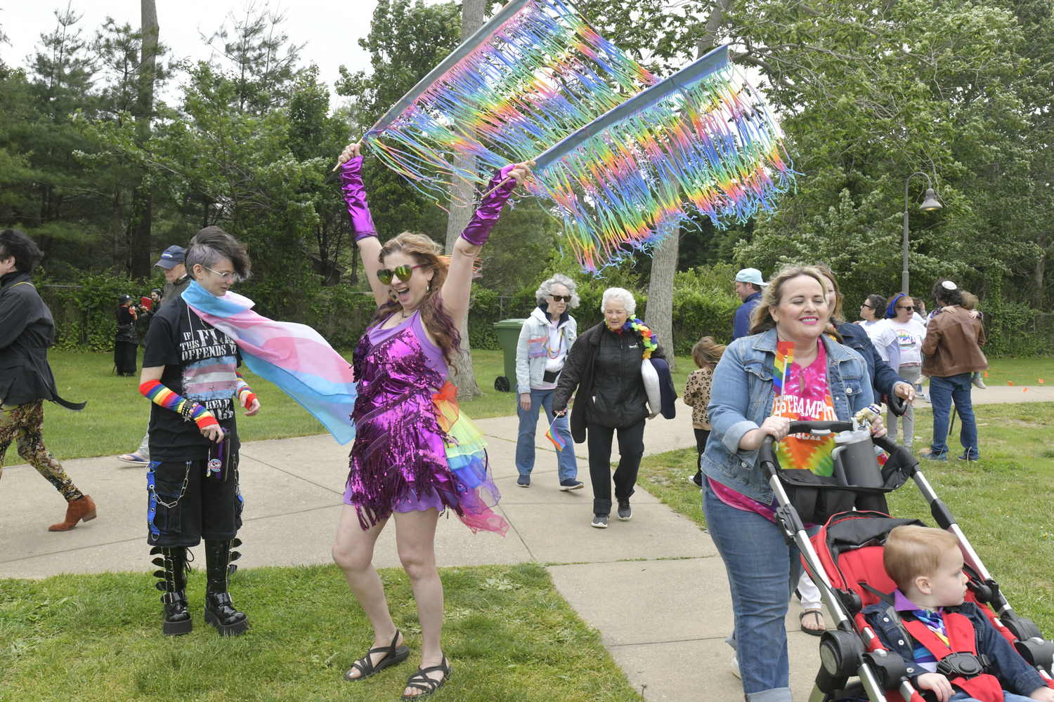 Revelers in Herrick Park after the Pride Parade on Saturday.     DANA SHAW