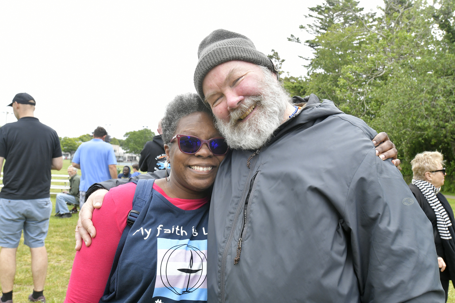 Rev. Kimberly Quinn Johnson with Ken Dorph in Herrick Park after the Pride parade.   DANA SHAW