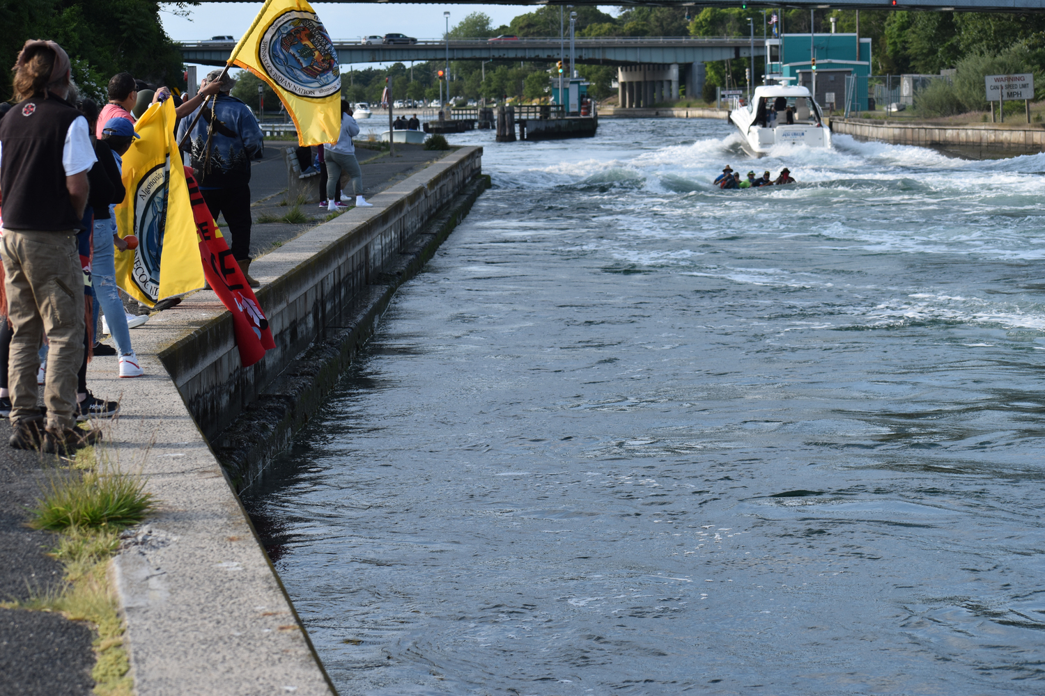 Six people on a multiday canoe journey from Boston to New York City were passing through the Shinnecock Canal on Friday when a motorboat going the opposite direction began zig-zagging, creating a wake that swamped the canoe.    STEPHEN J. KOTZ