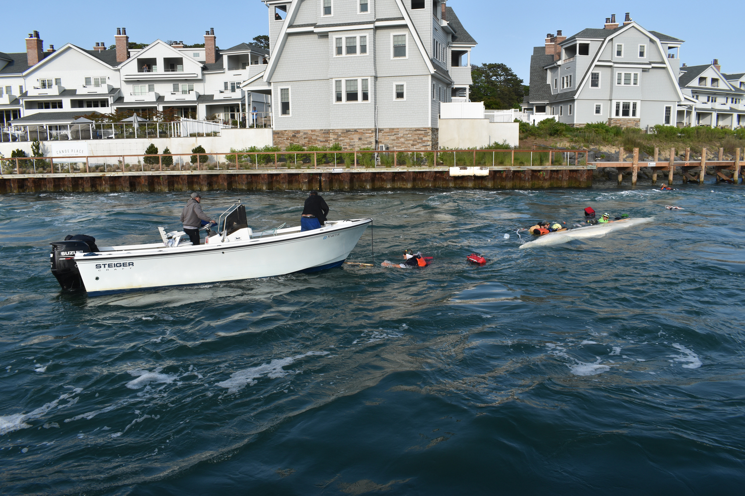 Six people on a multiday canoe journey from Boston to New York City were passing through the Shinnecock Canal on Friday when a motorboat going the opposite direction began zig-zagging, creating a wake that swamped the canoe.    STEPHEN J. KOTZ