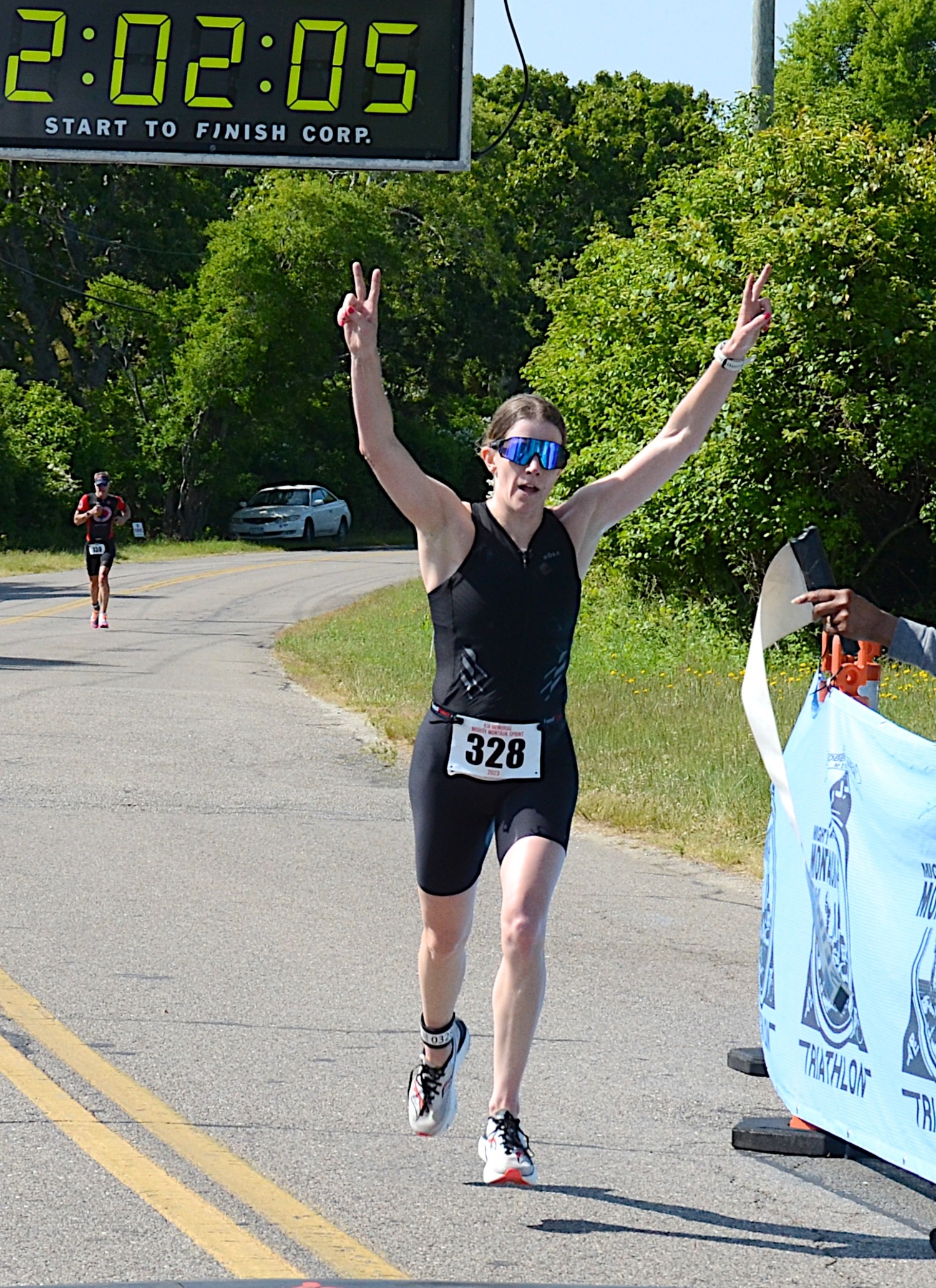 Caitlin Kappel of East Hampton was the female champion of the sprint triathlon.   KYRIL BROMLEY