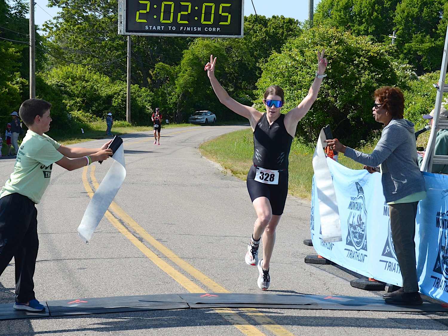 Caitlin Kappel of East Hampton was the female champion of the sprint triathlon.     KYRIL BROMLEY