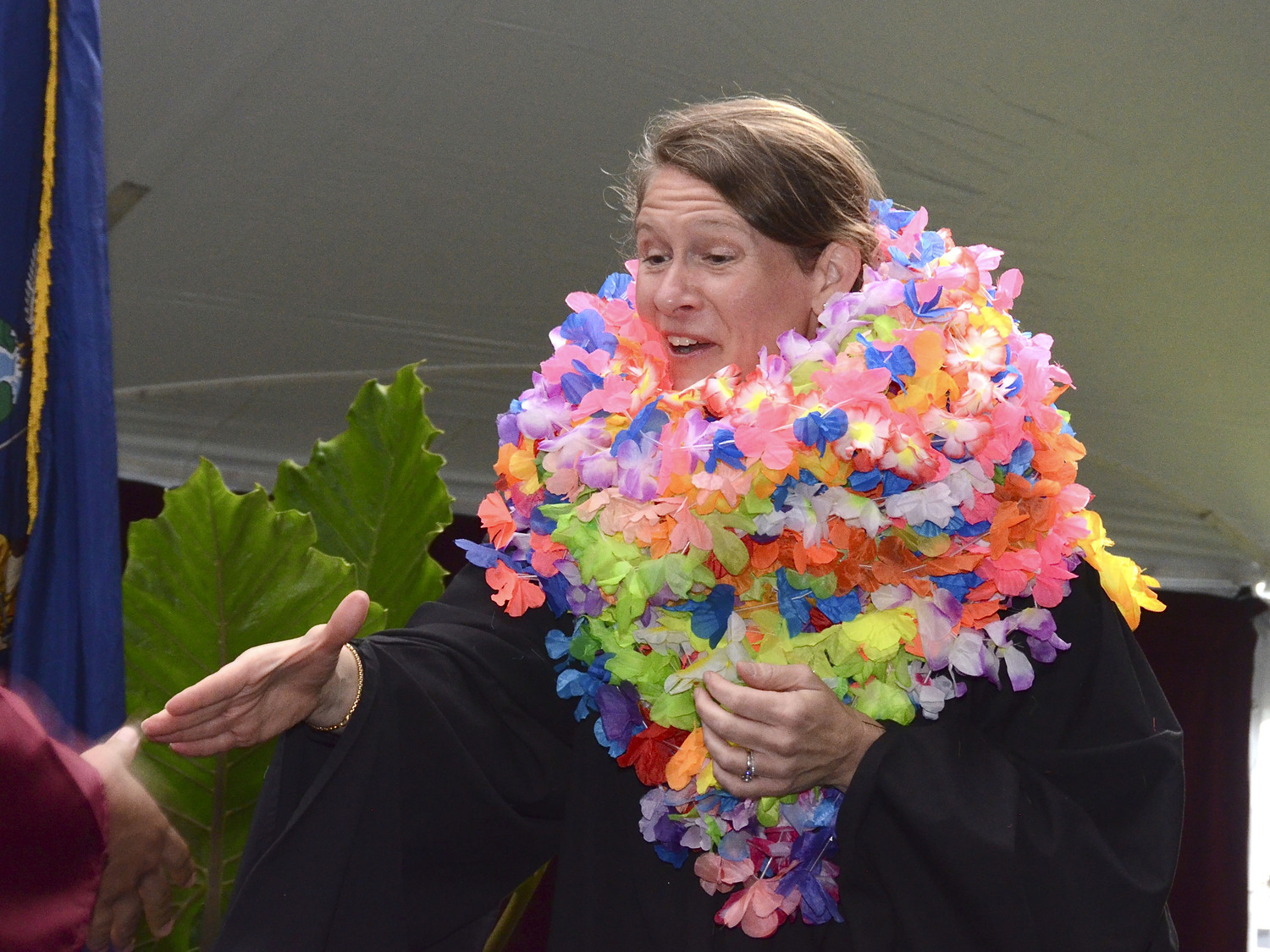 East Hampton High School Superintendent  Sara Smith was presented with leis from the graduates.  KYRIL BROMLEY